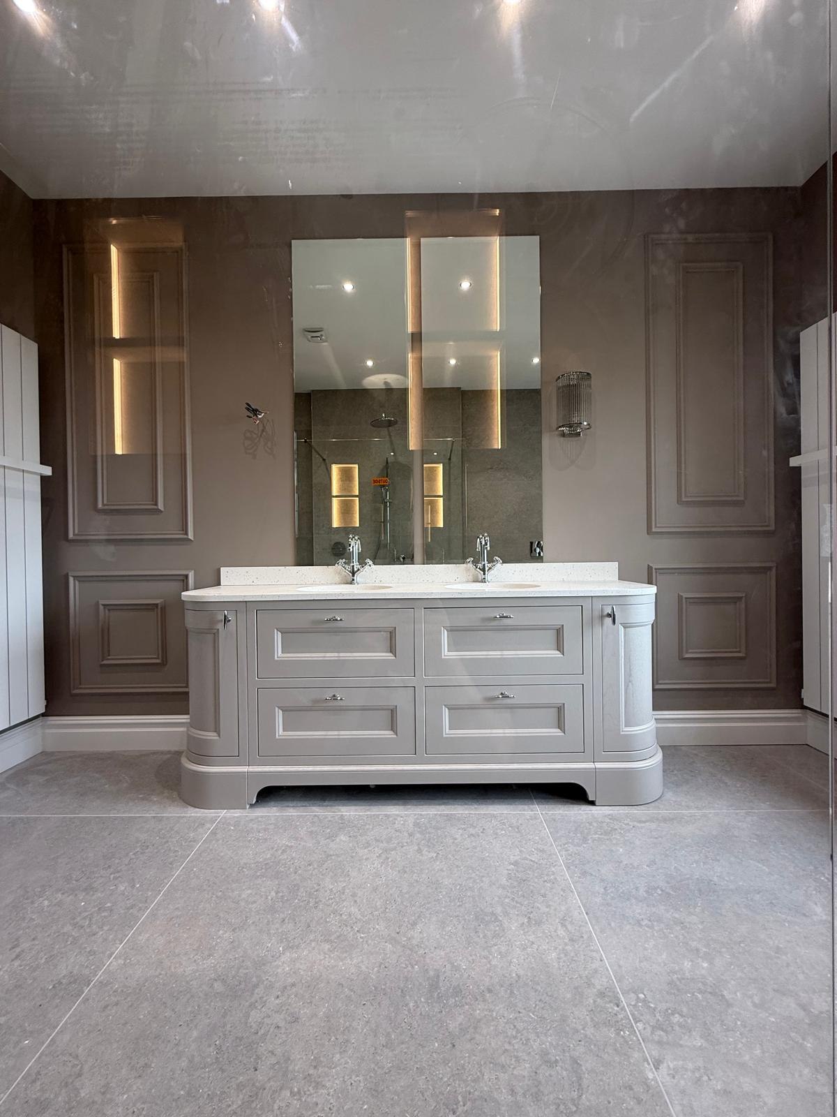 Bespoke painted twin vanity with quartz top and panelled walls in Giffnock main en-suite